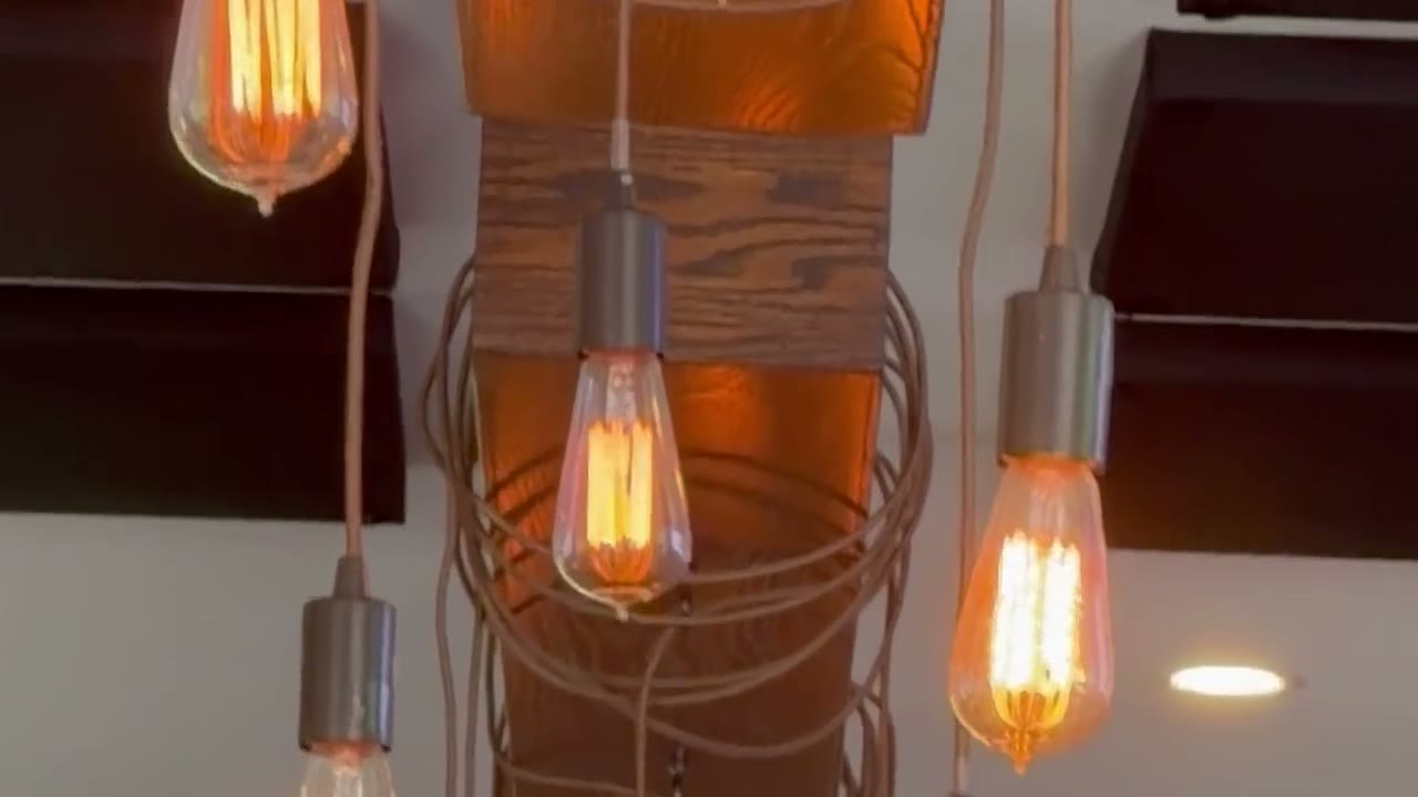 Real Pub 235 footage: Edison lights, bar glassware, bartenders, pizza and salad